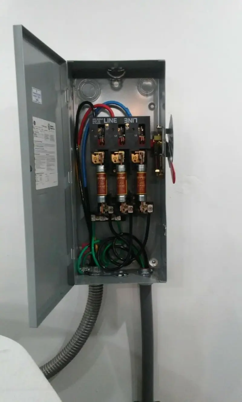 Three-phase disconnect switch installed for Smoke Detector Installation in North Bay Village